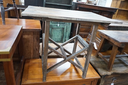 A provincial rectangular pine occasional table on folding stand, width 86cm, depth 63cm, height 73cm